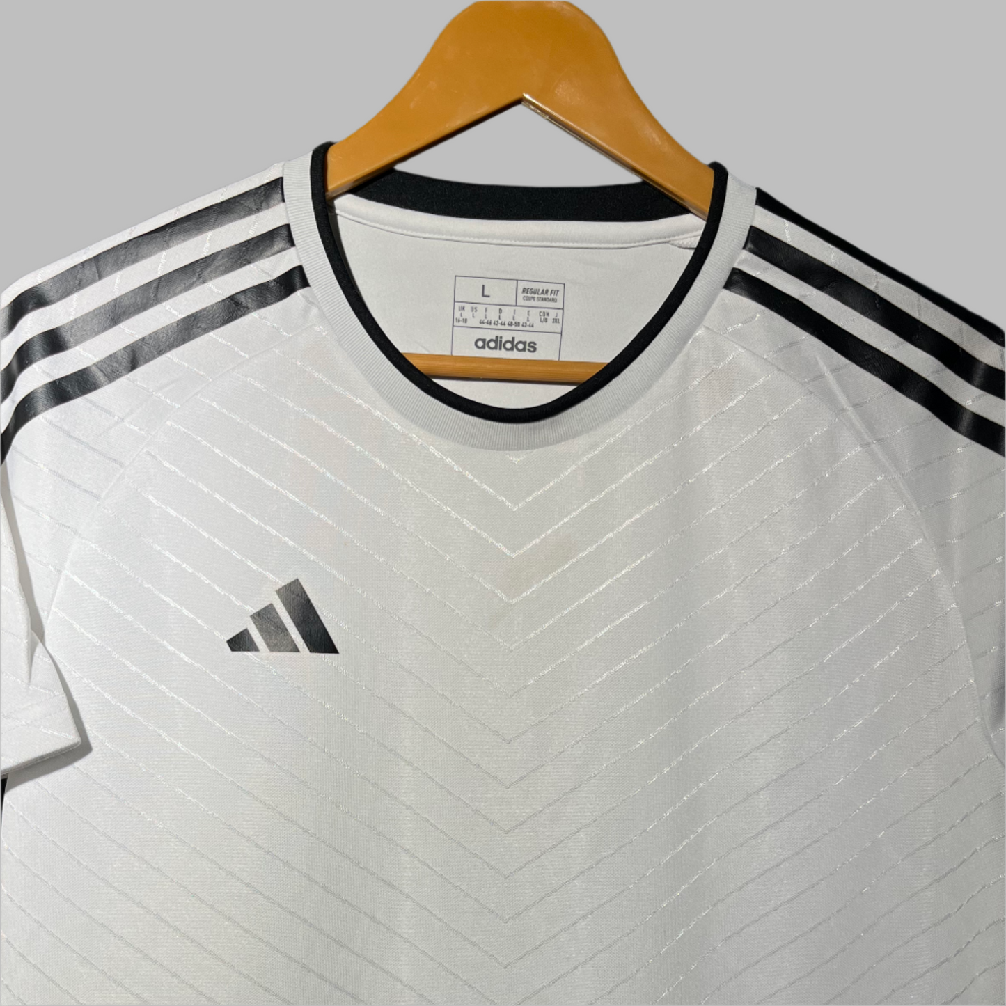 Adidas White Dry-Fit Performance T-Shirt – Classic Style, Modern Comfort.